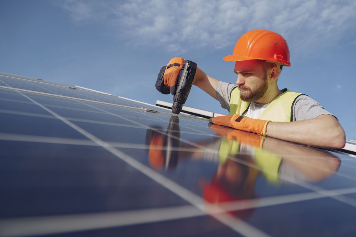 Econova engineers inspecting a rooftop solar installation site